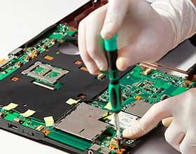 PC motherboard being repaired