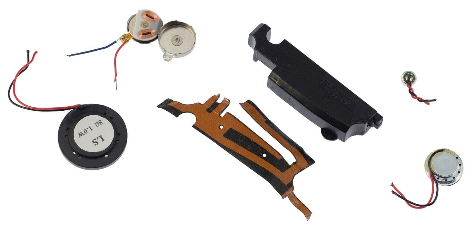 Smartphone disassembled into its component parts, including screen and battery, laid out during a screen replacement repair